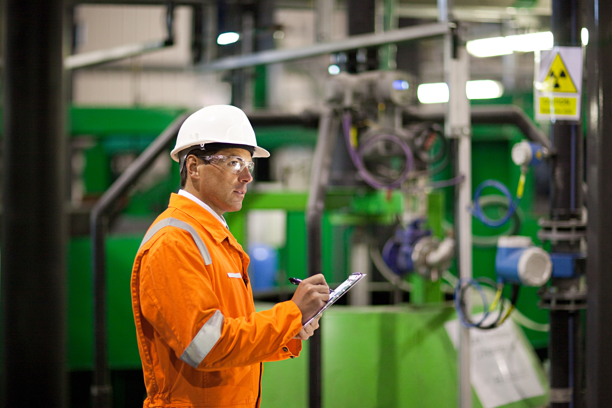 Engineer Inspecting Machine