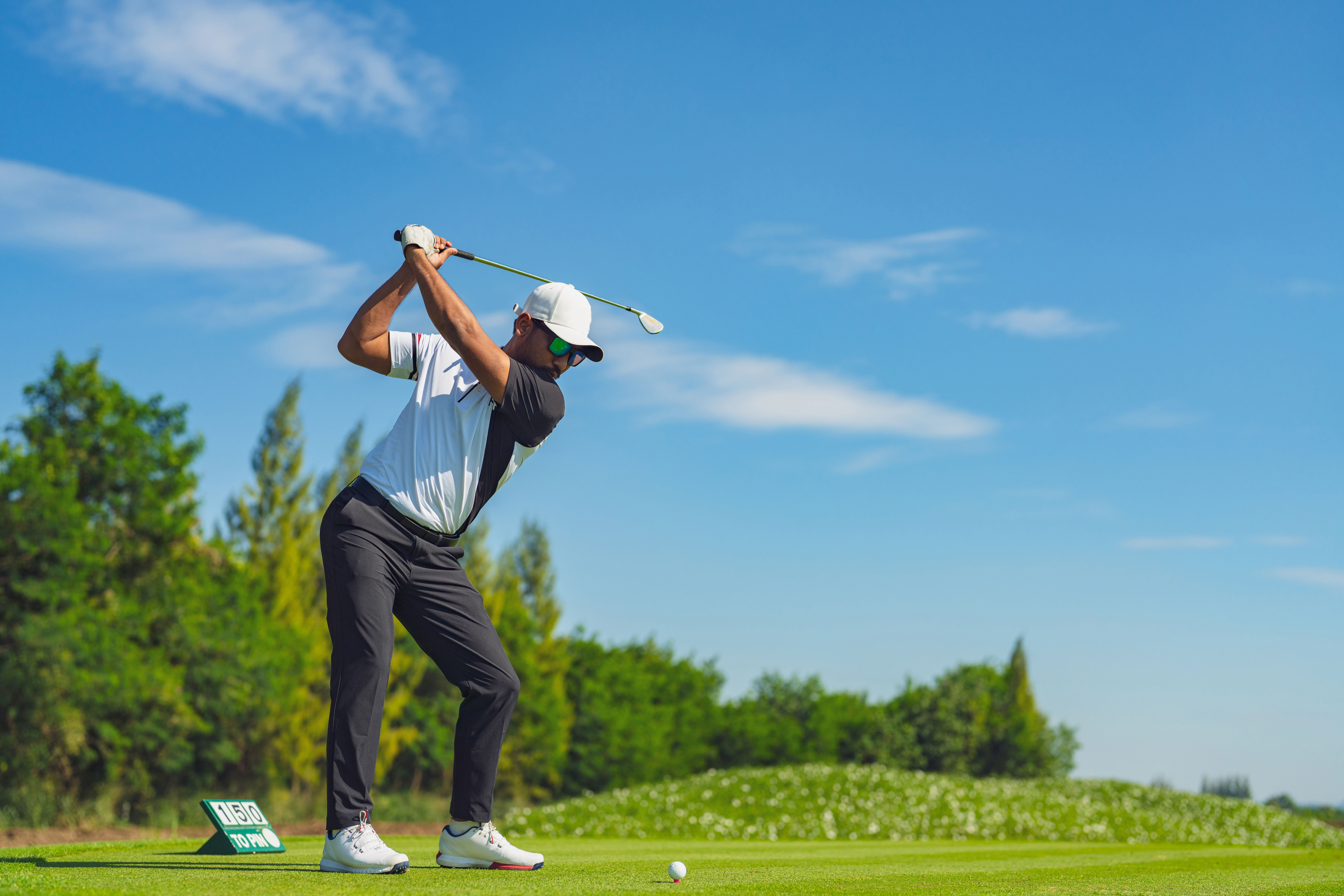 Man playing golf